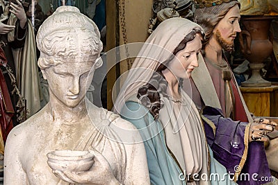 sculptures of madonna and christ in artist studio close up Vector Illustration