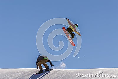 MADONNA DI CAMPIGLIO TN, ITALY, APRIL 9, 2017. Snowboarder enjoying jumps and runs Editorial Stock Photo