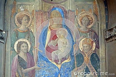 Madonna Enthroned with Saints and Angels, fresco, corner of Via della Scala and Piazza Santa Maria Novella in Florence Stock Photo