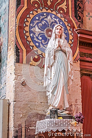 Madonna statue in the church of Gordes Editorial Stock Photo