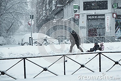 Madrid, Spain - January 9, 2021. Historic snowfall over the city in Arganzuela district Editorial Stock Photo