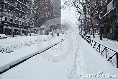 Madrid, Spain - January 9, 2021. Historic snowfall over the city in Arganzuela district Editorial Stock Photo