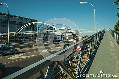 Footbridge for pedestrians over highway in Madrid Editorial Stock Photo