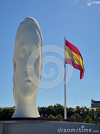 Julia, a sculpture by Jaume Plensa. Plaza de Colon square. Editorial Stock Photo