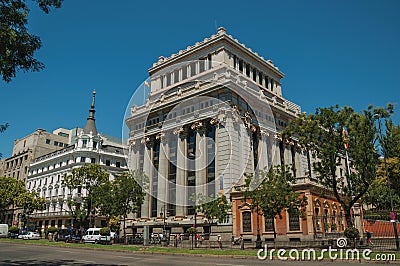 Buildings on the busy street with people and cars in Madrid Editorial Stock Photo