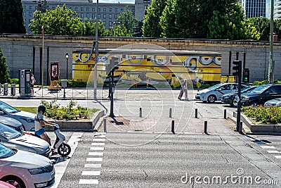 Madrid, Spain - June 17 : Minions painted next to the traffic si Editorial Stock Photo