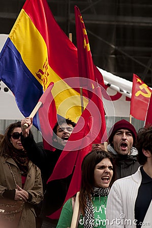 Communist demonstrators waving flags and chanting Editorial Stock Photo