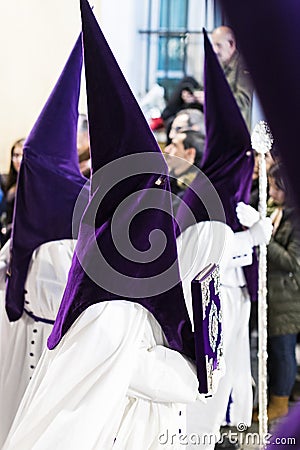 The traditional profession of religious Catholic orders during the Holy Week of the course of sinners along the streets of Madrid. Editorial Stock Photo