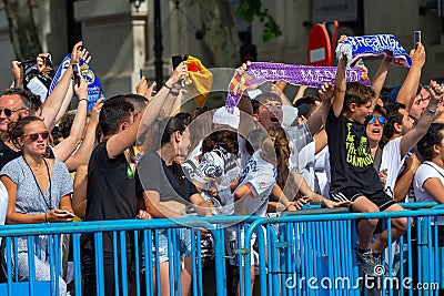 Madrid, Spain- May 29, 2022: Real Madrid C.F celebrates its 14th European Championship in Madrid. Team fans wave flags and scarves Editorial Stock Photo