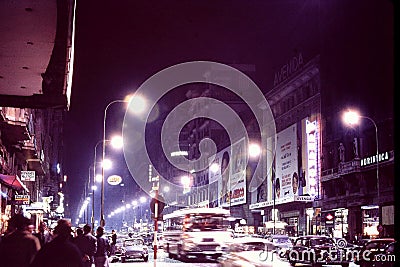 MADRID, SPAIN: NIGHT SHOT OF `LA AVENIDA DE JOSE ANTONIO` a. k. a. `LA GRAN VIA, ` MADRID`S MAIN STREET IN DECEMBER, 1966 Editorial Stock Photo