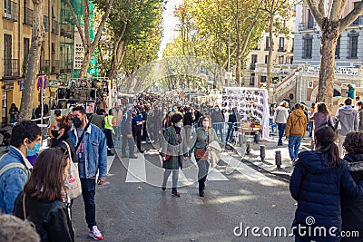Madrid street market, known as `El Rastro` crowded with people the day it reopened after closing due to the Covid-19 pandemic Editorial Stock Photo