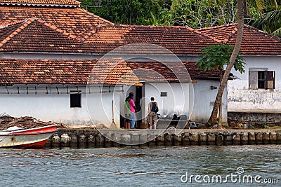 MADU GANGA, SRI LANKA - 7 DECEMBER 2013: People in Kothduwa temple in Sri Lanka Editorial Stock Photo