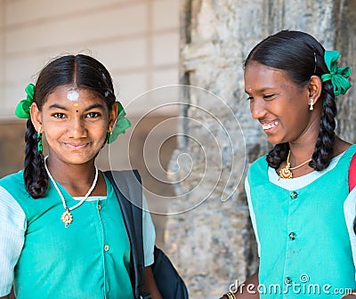MADURAI, INDIA - FEBRUARY 16: An unidentified smiling girl in sc Editorial Stock Photo