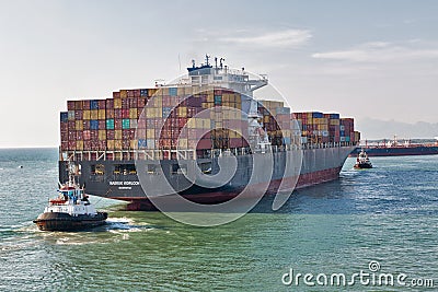 Maersk Kowloon cargo container ship entering port of Livorno, Italy Editorial Stock Photo