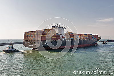 Maersk Kowloon cargo container ship entering port of Livorno, Italy Editorial Stock Photo