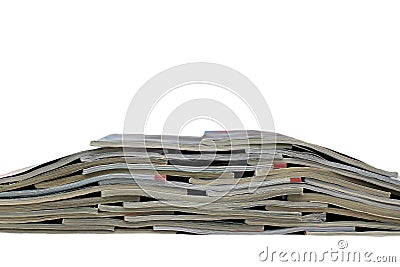 A stack of old magazines in disordered condition Stock Photo