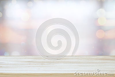 mage of wooden table in front of abstract blurred window light background Stock Photo