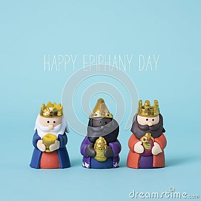 The magi and the text happy epiphany day Stock Photo