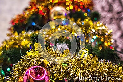 Magic beautiful christmas tree with old fashioned, retro christmas toys close-up and beautiful garland lights Stock Photo