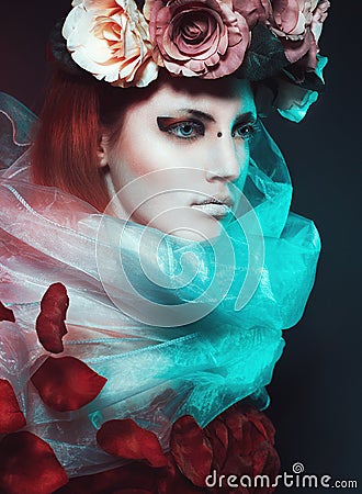 Magic girl with roses Stock Photo