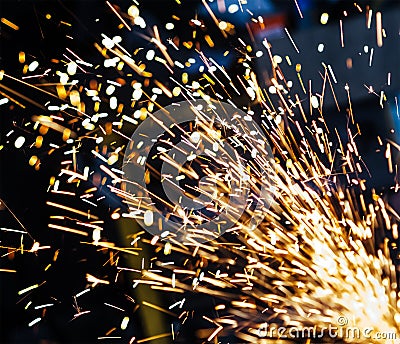 Magic glowing Flow of Sparks in the Dark background. Stock Photo