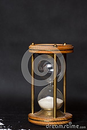 Magic hourglass with blue shiny flares Stock Photo