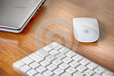 Magic Keyboard, Magic Mouse of Apple iMac and Laptop Acer Editorial Stock Photo