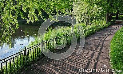 Summer landscape. Alley in the park. Magic place. Relaxation corner Stock Photo