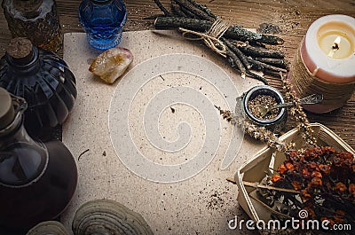 Magic potion and blank recipe scroll. Phytotherapy. Alternative herbal medicine. Shaman. Druidism. Stock Photo