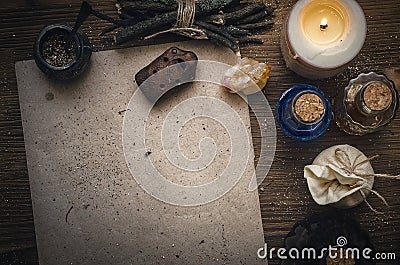 Magic potion and blank recipe scroll. Phytotherapy. Alternative herbal medicine. Shaman. Druidism. Stock Photo