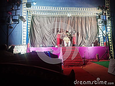 Magic show performance by indian magician on golden costume in India nov 2019 Editorial Stock Photo