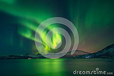 Magical boreal aurora illuminates the sky Stock Photo