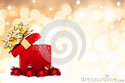 Magical Christmas Gift Background With Red Baubles Stock Photo