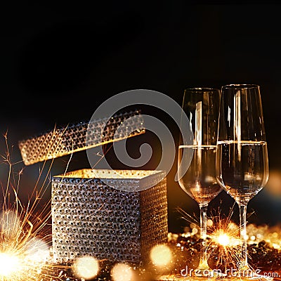 Magical gift with champagne Stock Photo