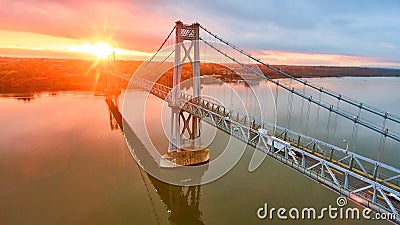 Magical golden sunrise over Hudson river bridge in New York from drone over water Editorial Stock Photo