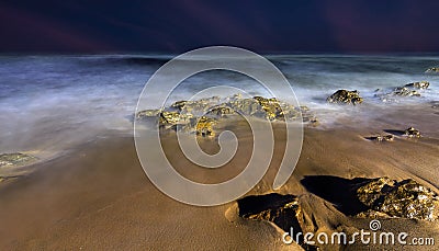 Magical long exposure waves at Rishikonda beach, Vizag, India Stock Photo