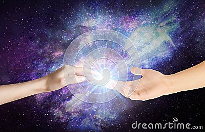 Magical love healing energy from hands universe background Stock Photo