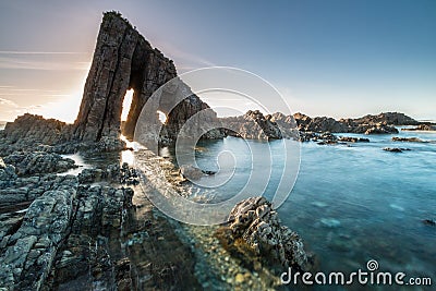 Magical monolith in Asturian beach Stock Photo