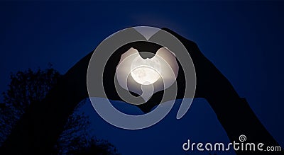 Magical moon energy healing universal energy, heart hands Stock Photo