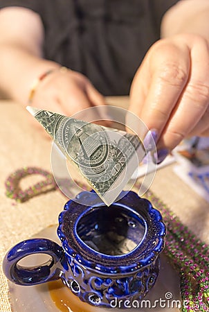 A magical ritual to attract money. Stock Photo