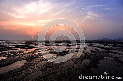 Magical sunset along a coast line Stock Photo