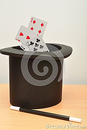 Magicians hat, and and cards Stock Photo