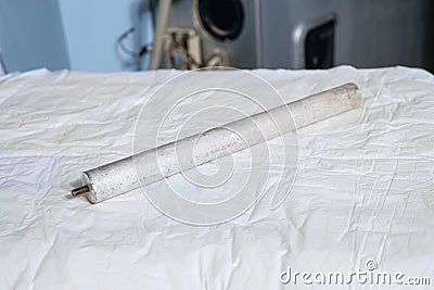 Magnesium anode for heating element of an electric water heater Stock Photo
