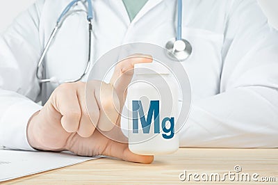 Essential supplement magnesium Mg for heart human. doctor recommends taking magnesium. doctor talks about Benefits of magnesium. Stock Photo