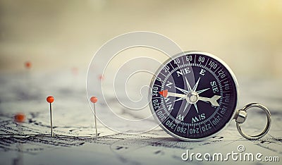 Magnetic compass on world map.Travel, geography, navigation, tourism and exploration concept background. Macro photo. Very Stock Photo