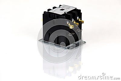 Magnetic contactor on white background. Stock Photo