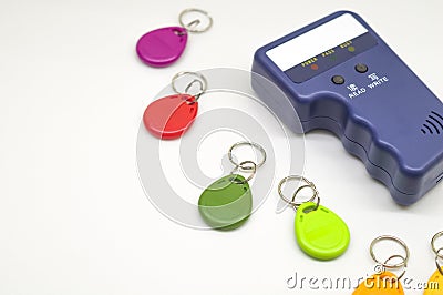 Magnetic key programmer. Duplicator for intercom keys. Electronic equipment for small businesses. Selective focus, copy Stock Photo