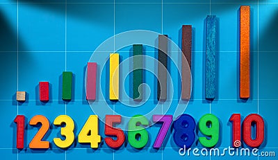 Magnetic Numbers and Wooden Colorful Pieces Stock Photo