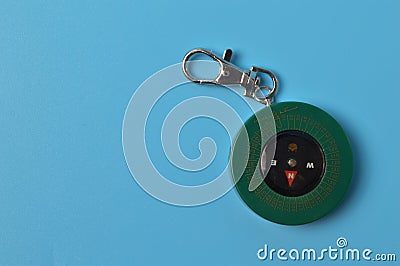 Magnetic qibla compass isolated on blue background Stock Photo