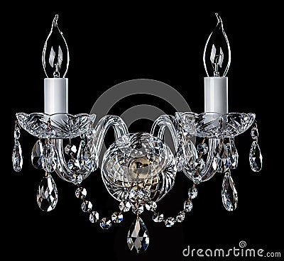 Magnificent bronze sconce on the dark background. Stock Photo